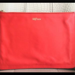 Alexander mcqueen orange red skull zip clutch.